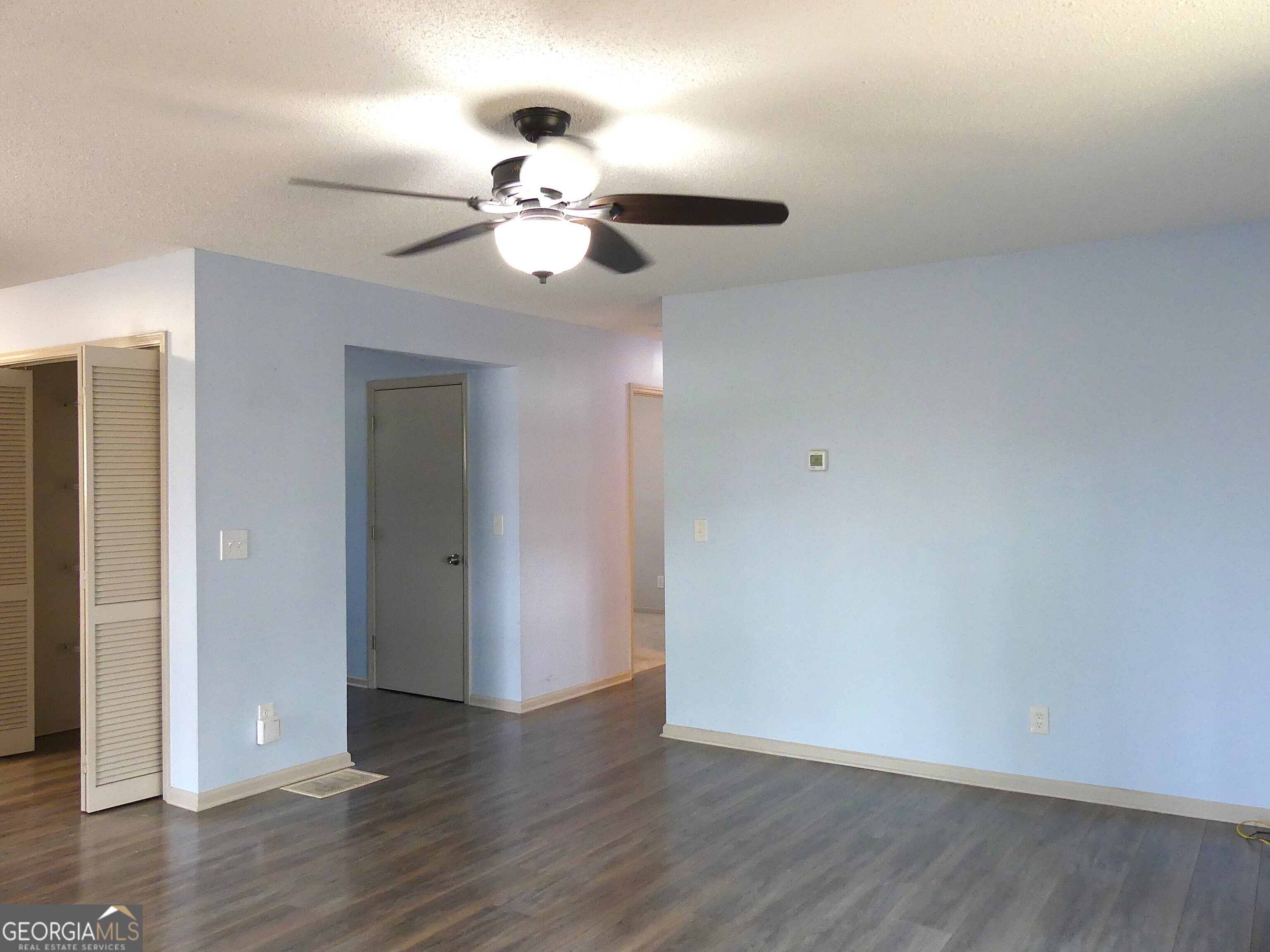185 Stancil Drive Toccoa, GA 30577 - Photo 20 of 36 a view of an empty room with wooden floor