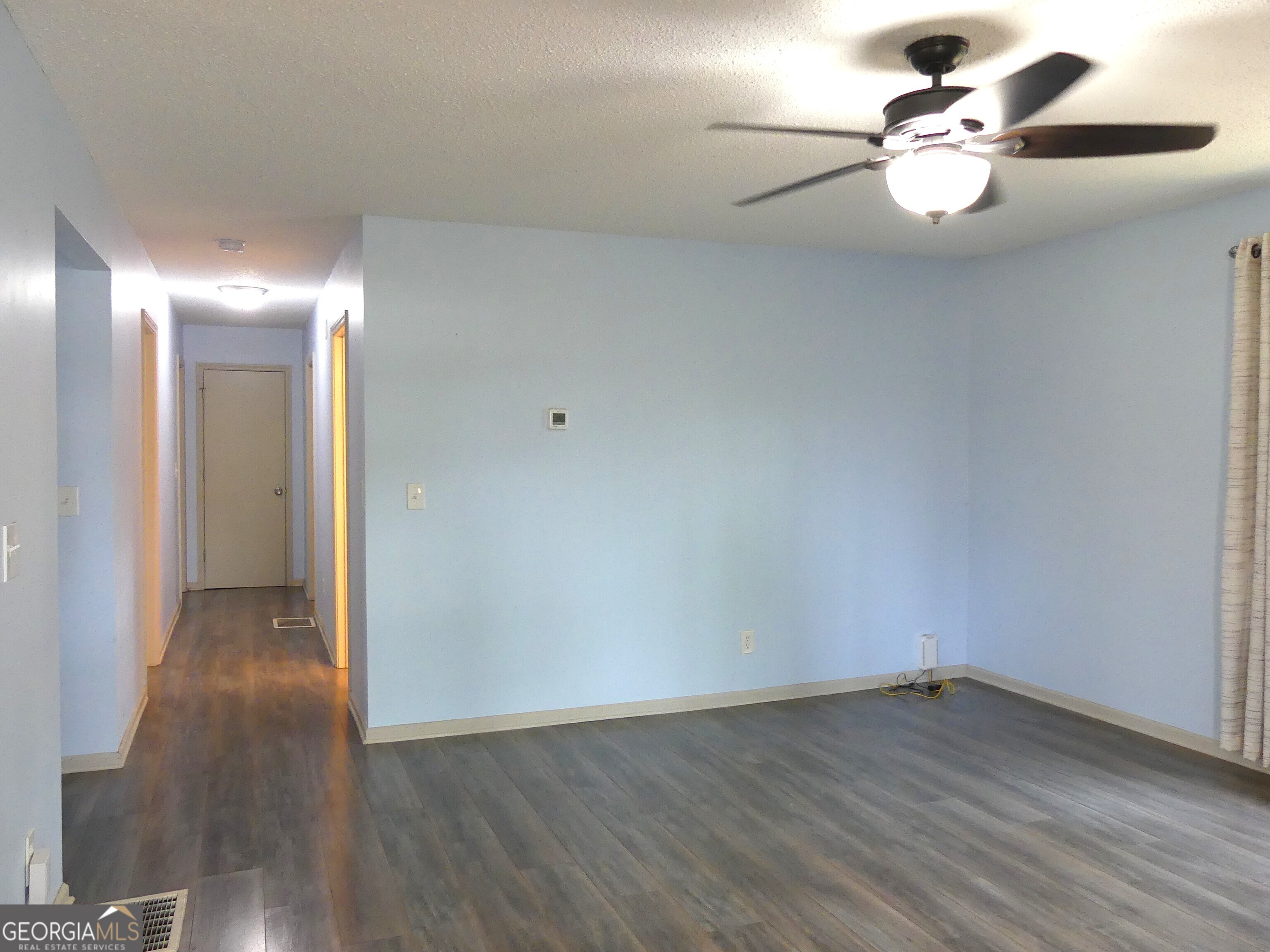 185 Stancil Drive Toccoa, GA 30577 - Photo 21 of 36 a view of an empty room and wooden floor