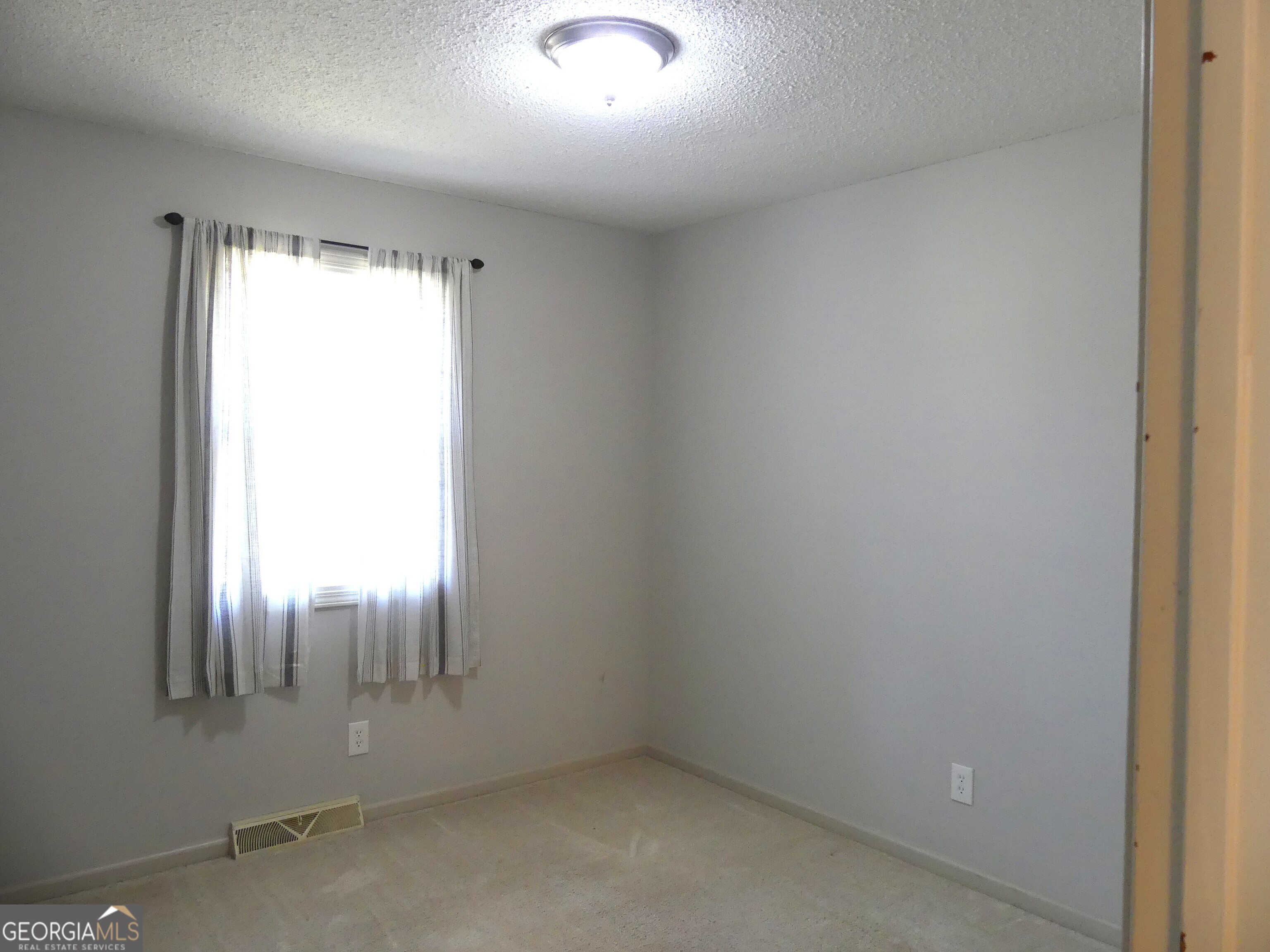 185 Stancil Drive Toccoa, GA 30577 - Photo 33 of 36 an empty room with window