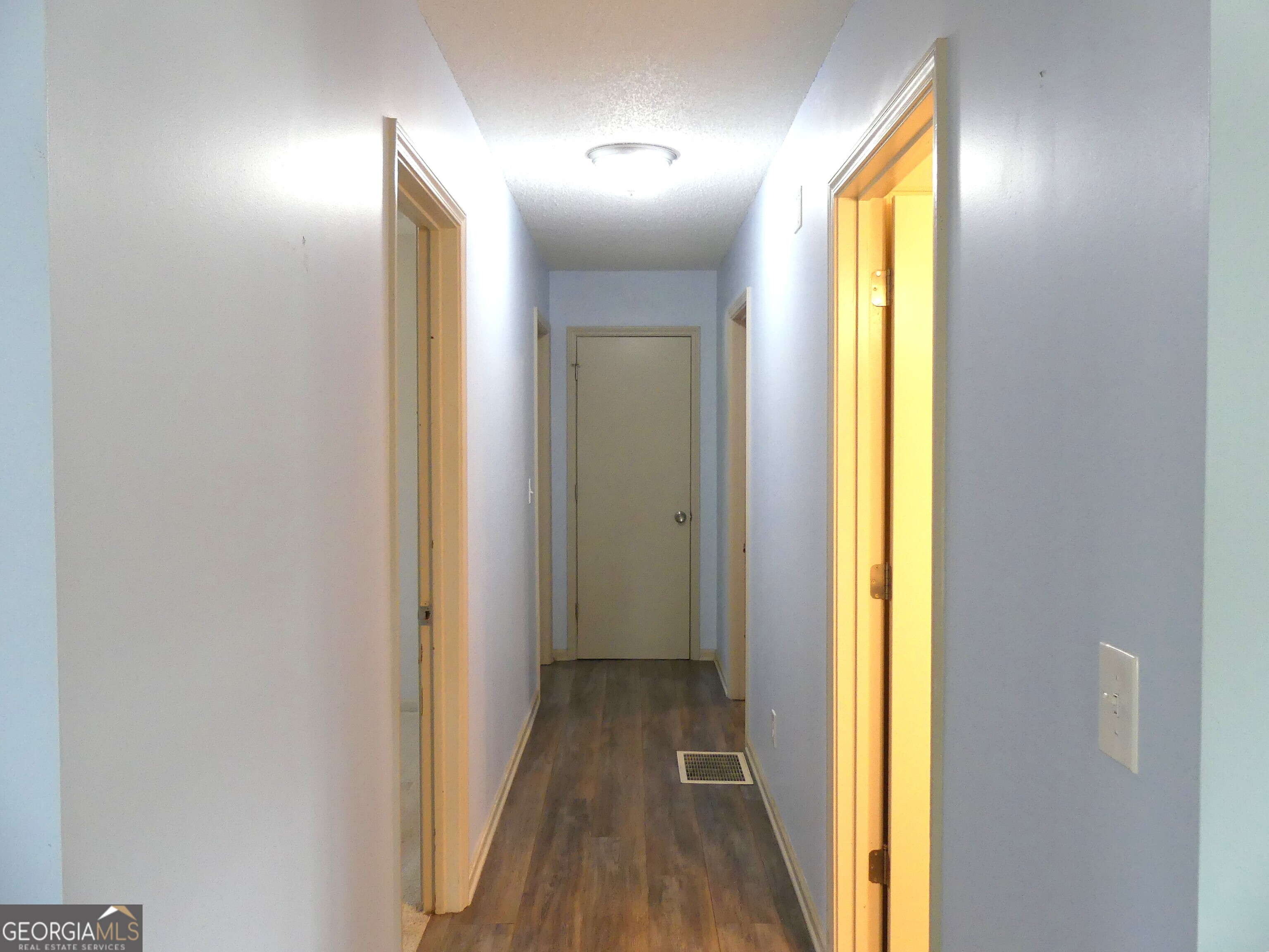 185 Stancil Drive Toccoa, GA 30577 - Photo 10 of 36 a view of a bathroom from a hallway