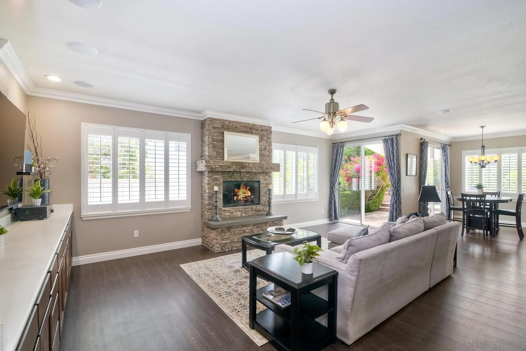 3670 Sutter Court Oceanside, CA 92056 - Photo 14 of 43 a living room with fireplace furniture and a large window