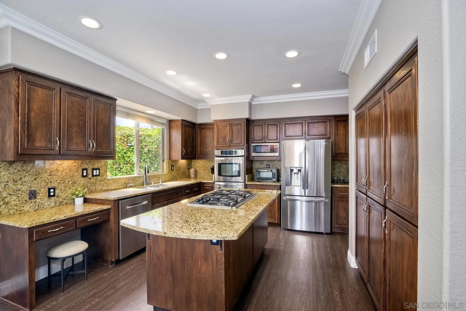 3670 Sutter Court Oceanside, CA 92056 - Photo 17 of 43 a kitchen with refrigerator and sink