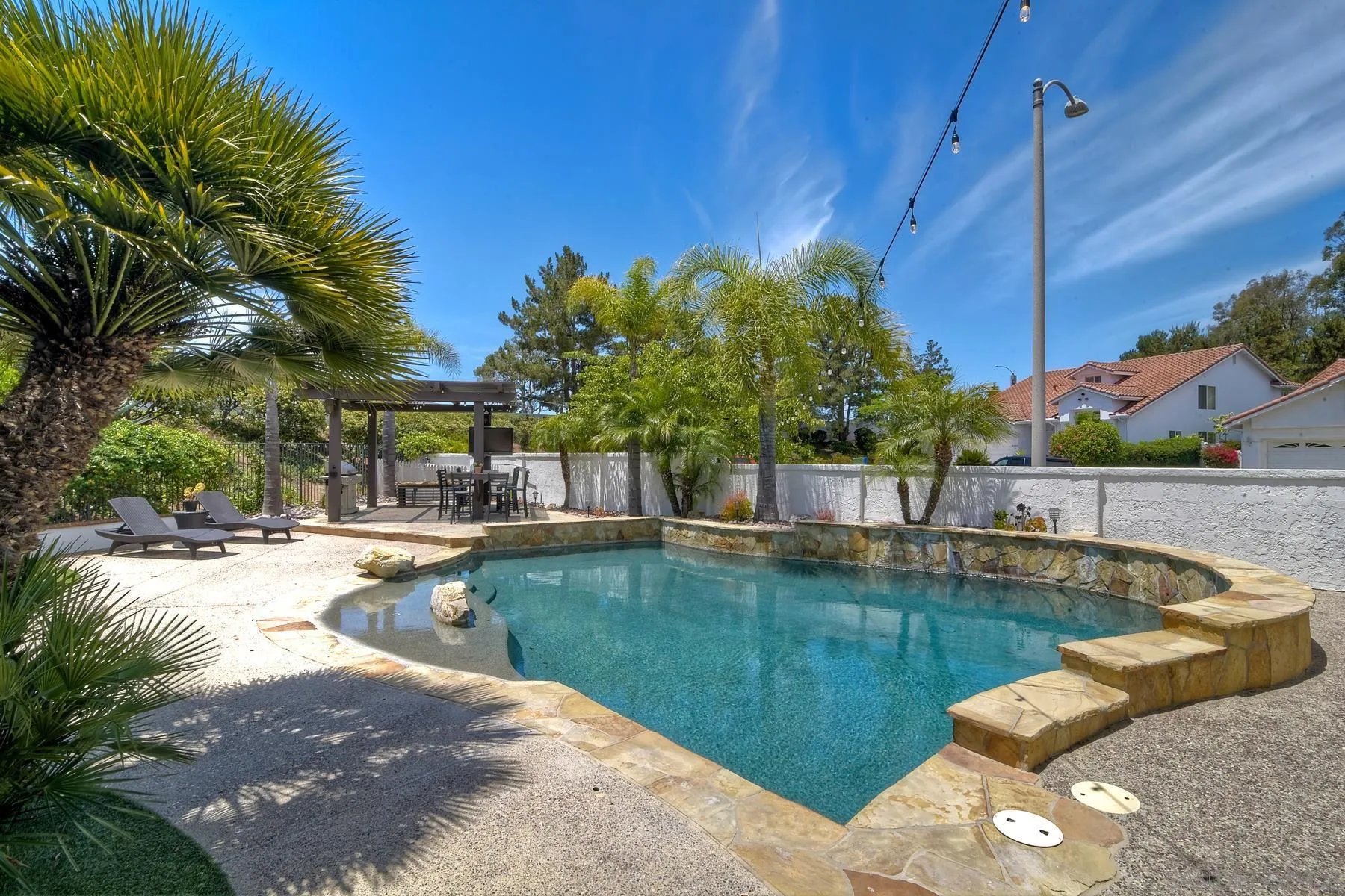 3670 Sutter Court Oceanside, CA 92056 - Photo 2 of 43 a view of a swimming pool with a patio