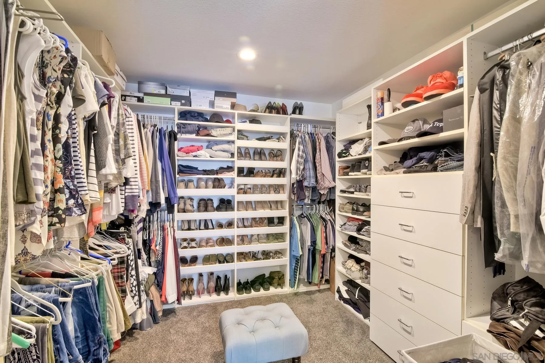 3670 Sutter Court Oceanside, CA 92056 - Photo 24 of 43 a view of walk in closet with clothes and shoes