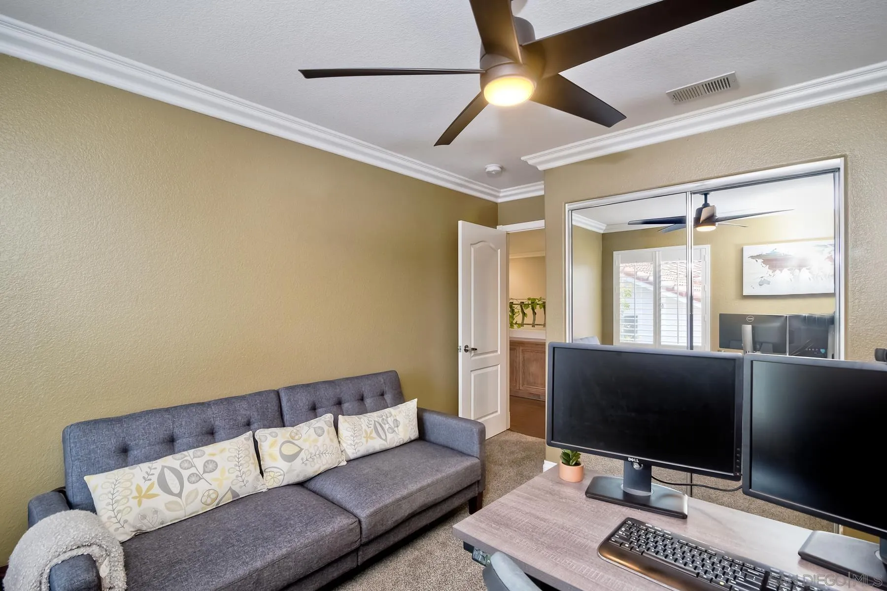3670 Sutter Court Oceanside, CA 92056 - Photo 29 of 43 a living room with furniture and a flat screen tv