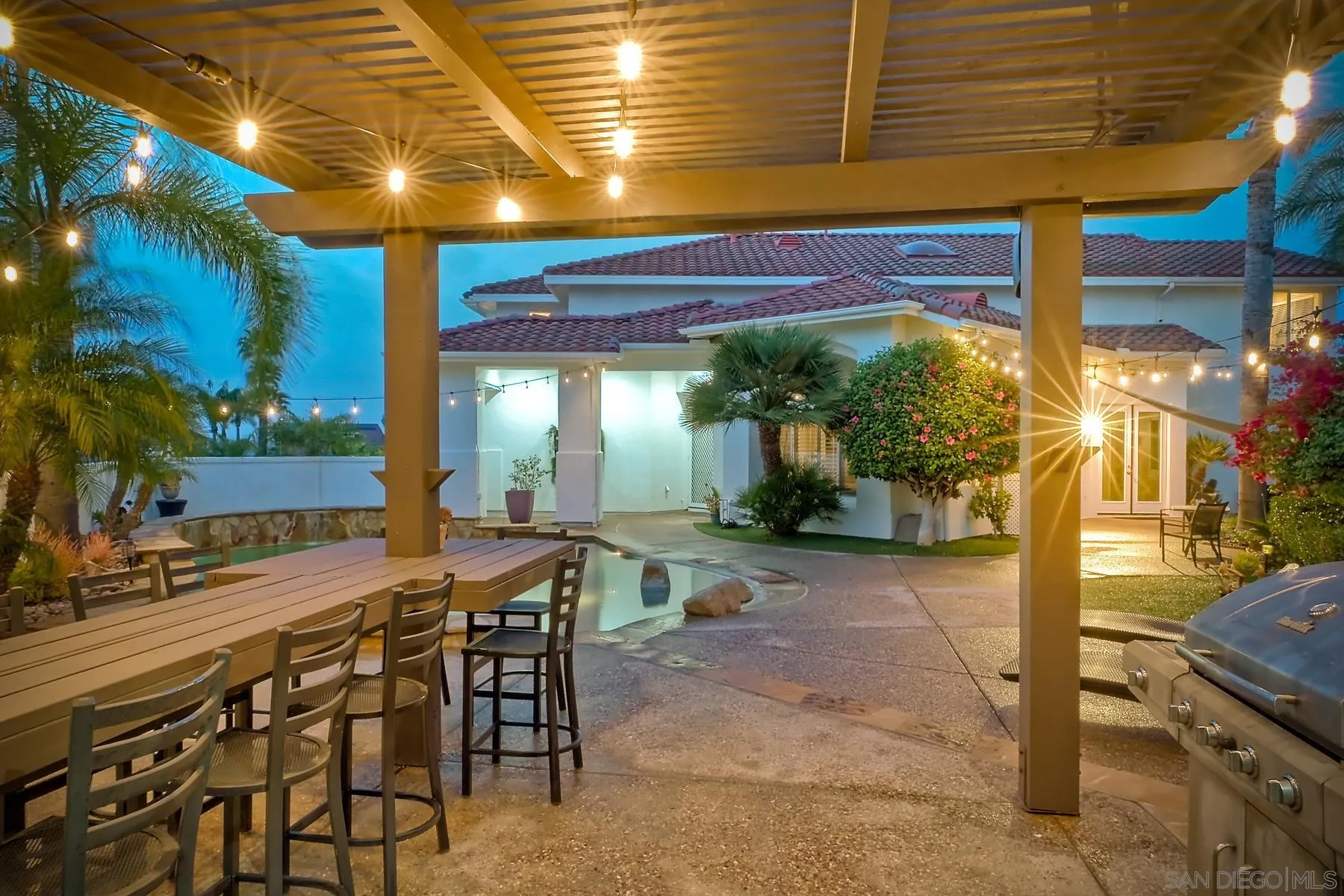 3670 Sutter Court Oceanside, CA 92056 - Photo 37 of 43 a view of a patio with table and chairs and potted plants