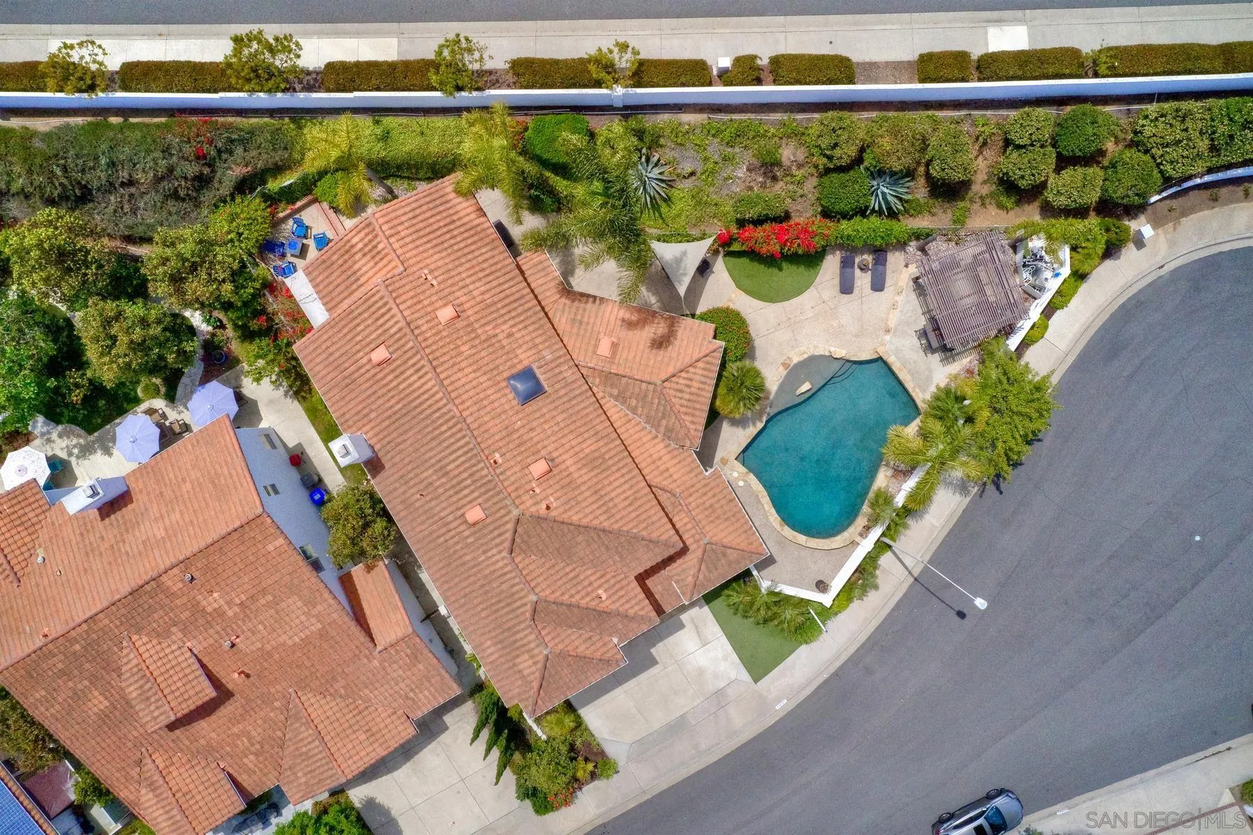 3670 Sutter Court Oceanside, CA 92056 - Photo 41 of 43 an aerial view of a house with a garden and lake view
