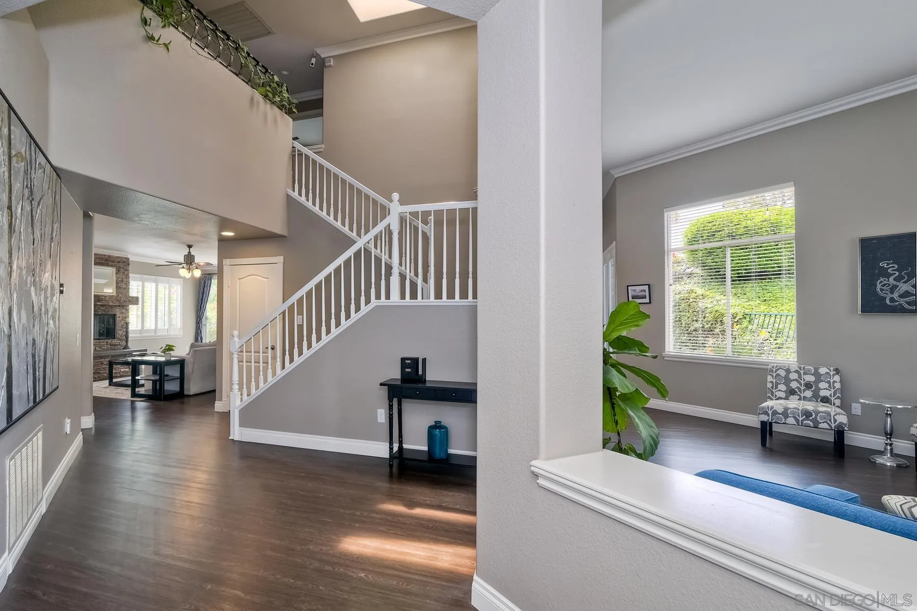3670 Sutter Court Oceanside, CA 92056 - Photo 5 of 43 a living room with furniture and a potted plant