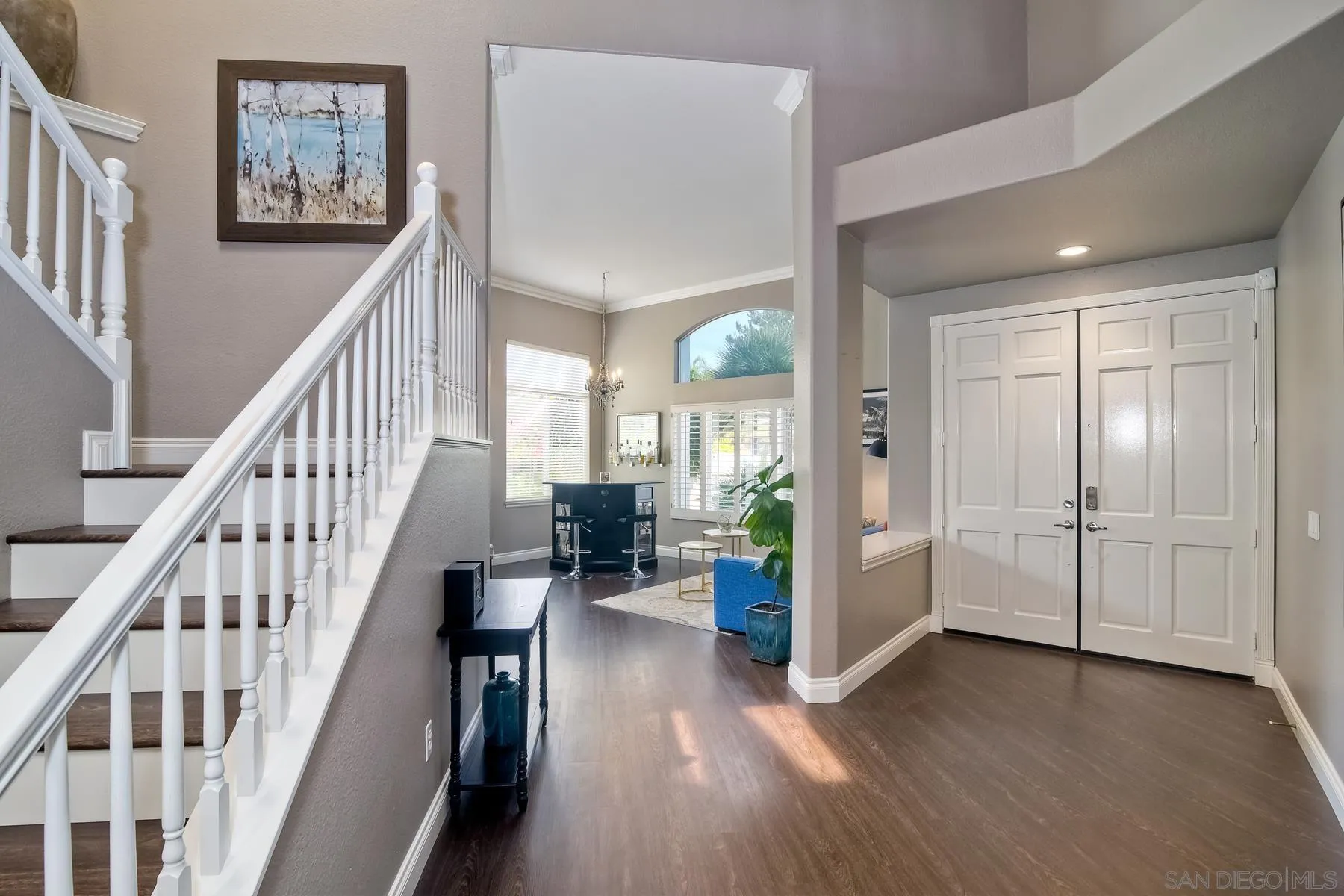 3670 Sutter Court Oceanside, CA 92056 - Photo 6 of 43 a view of entryway with wooden floor and windows