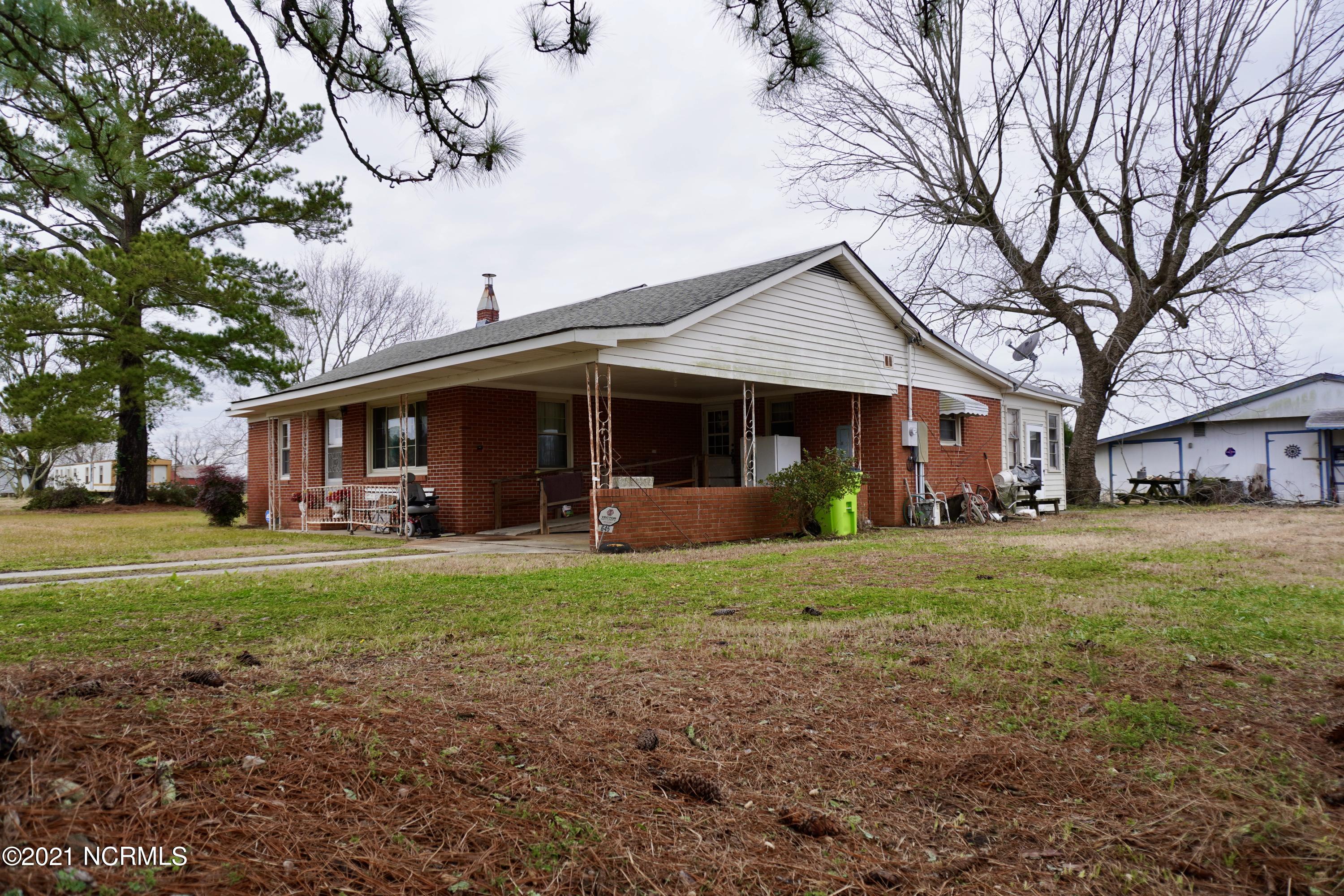 645 Gray Road Vanceboro, NC 28586 - Photo 3 of 8 Side Elevation & Carport View
