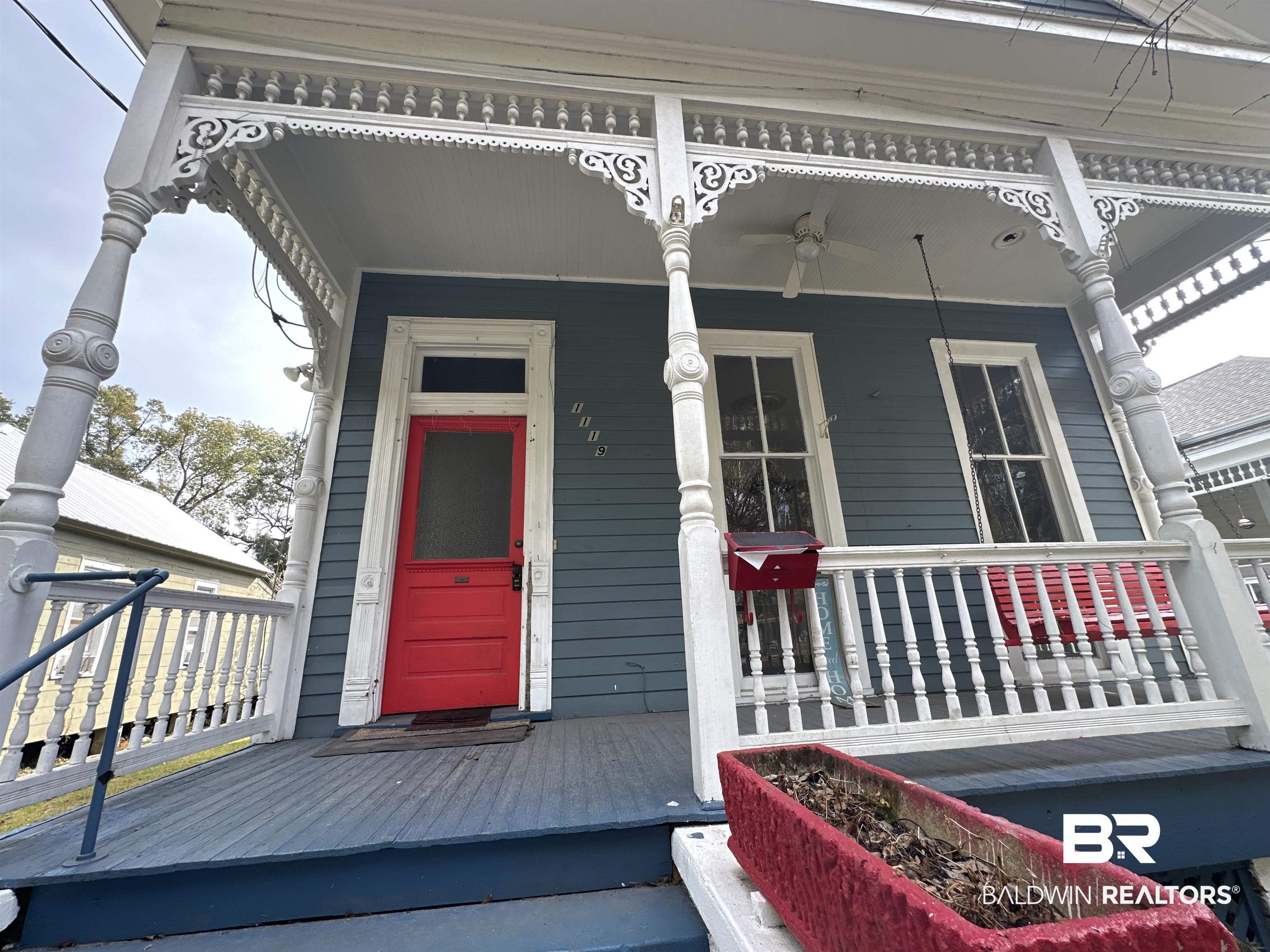 1119 Old Shell Road Mobile, AL 36604 - Photo 22 of 22 Doorway to property featuring ceiling fan and a porch