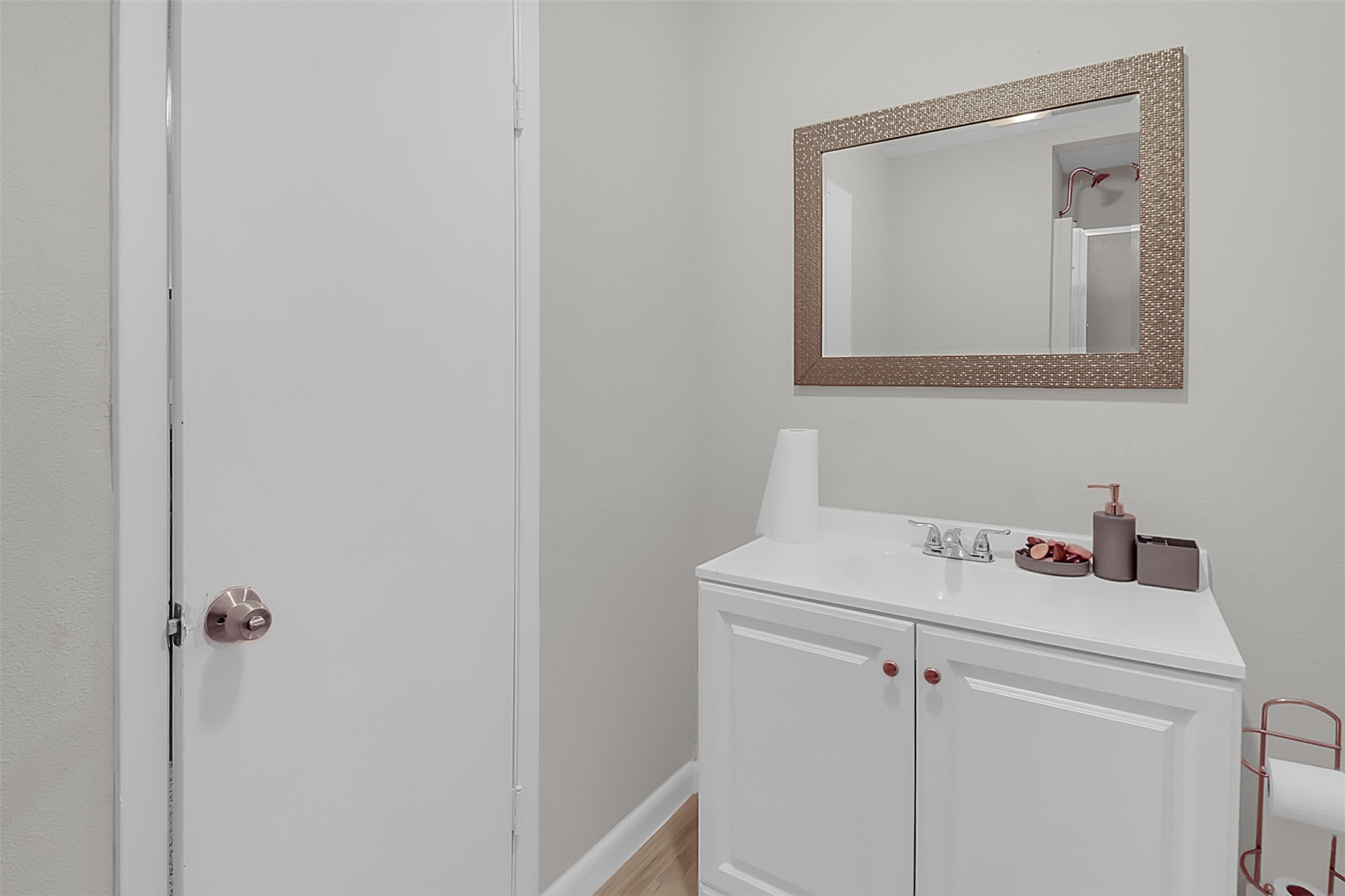 110 South 9th Street Highlands, TX 77562 - Photo 14 of 22 a bathroom with a sink vanity and a mirror