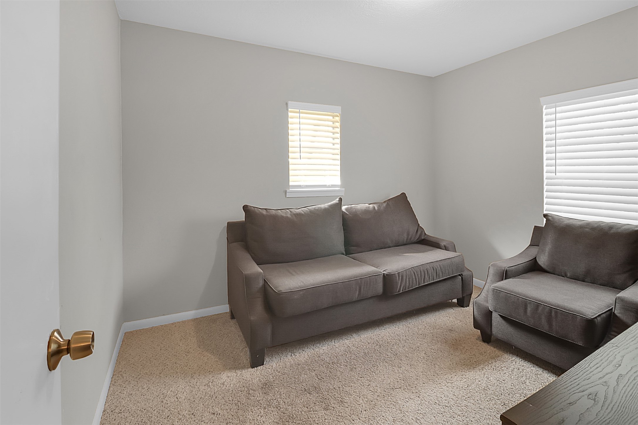 110 South 9th Street Highlands, TX 77562 - Photo 15 of 22 a living room with furniture and a window