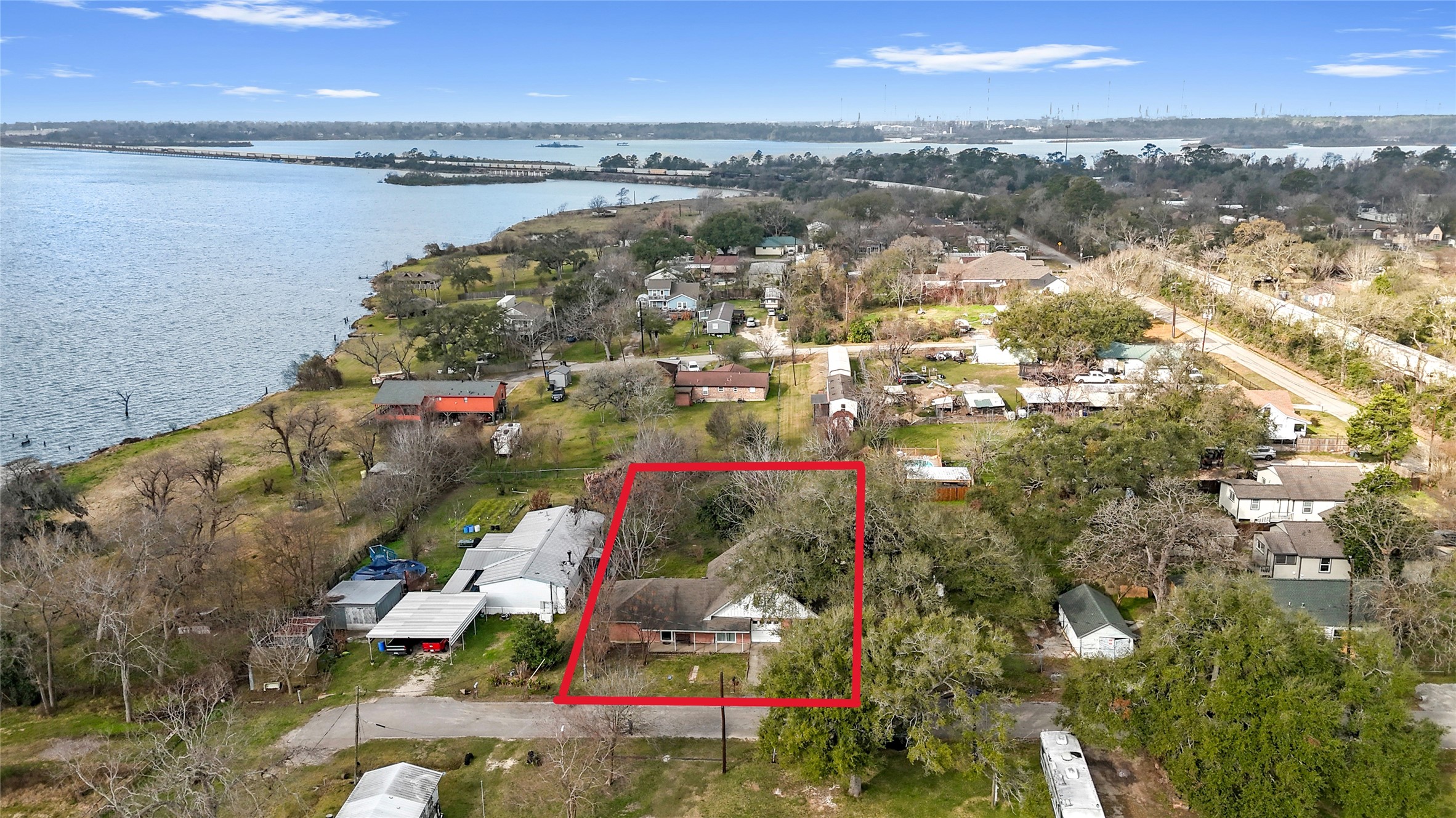 110 South 9th Street Highlands, TX 77562 - Photo 2 of 22 a view of lake and city