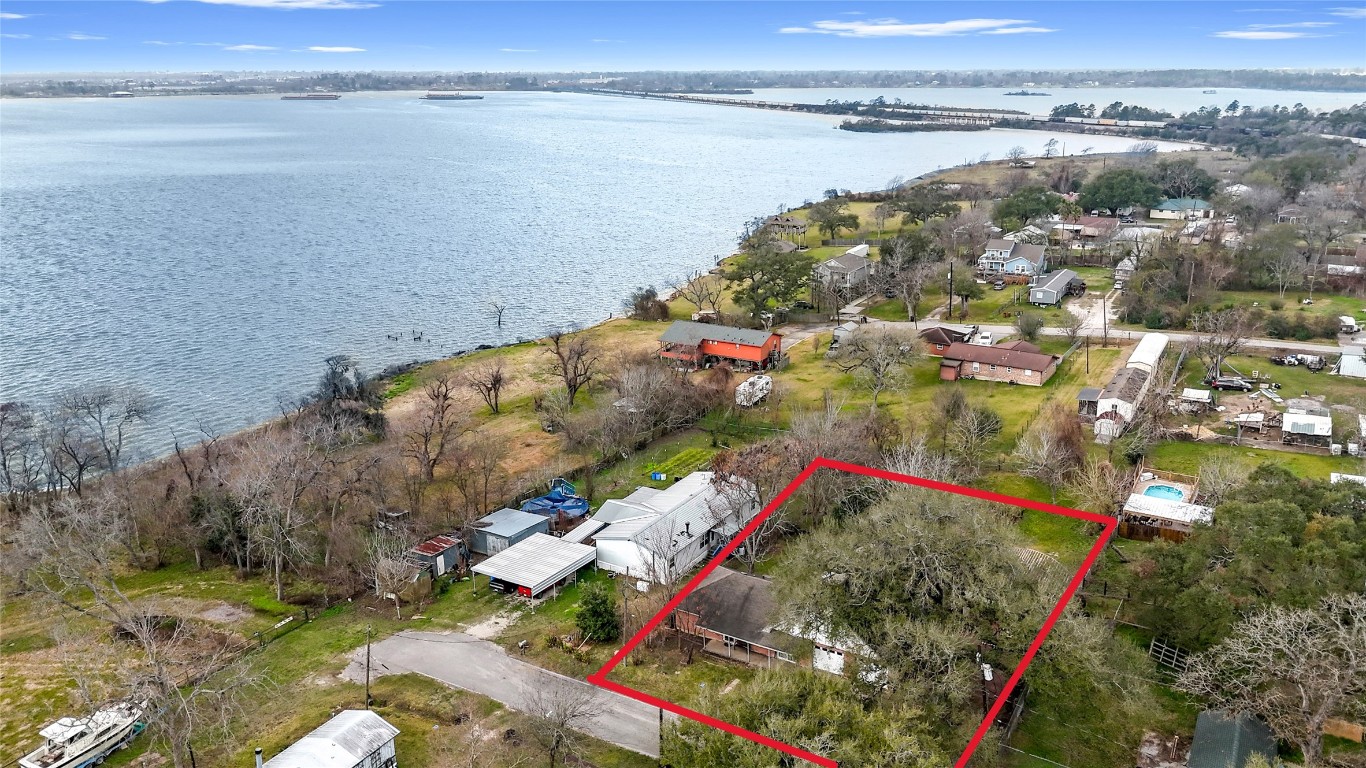 110 South 9th Street Highlands, TX 77562 - Photo 21 of 22 a view of a lake from a balcony