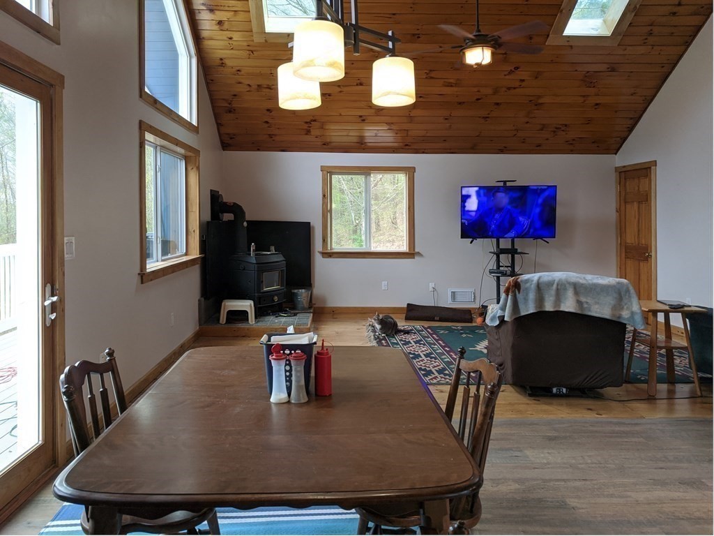 276 Old Gilbertville Road Ware, MA 01082 - Photo 6 of 42 a dining room with furniture and wooden floor