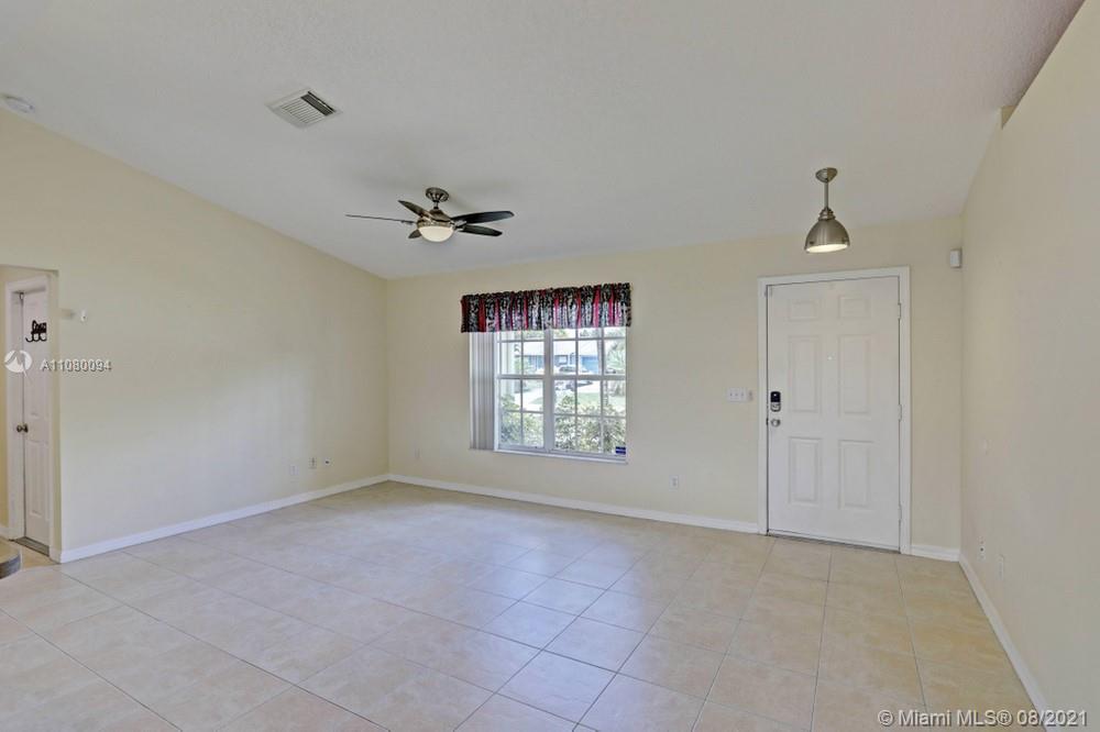 918 Southwest Longfellow Road, Unit 918 Port St. Lucie, FL 34953 - Photo 11 of 53 a view of an empty room with a window