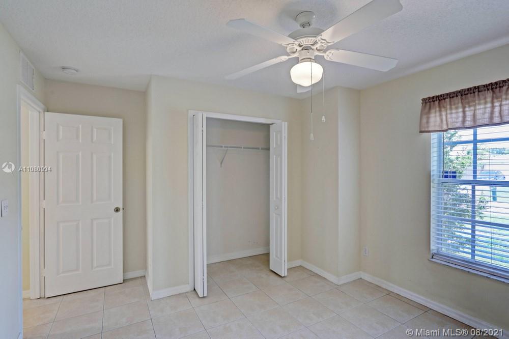 918 Southwest Longfellow Road, Unit 918 Port St. Lucie, FL 34953 - Photo 25 of 53 a view of an empty room with a window
