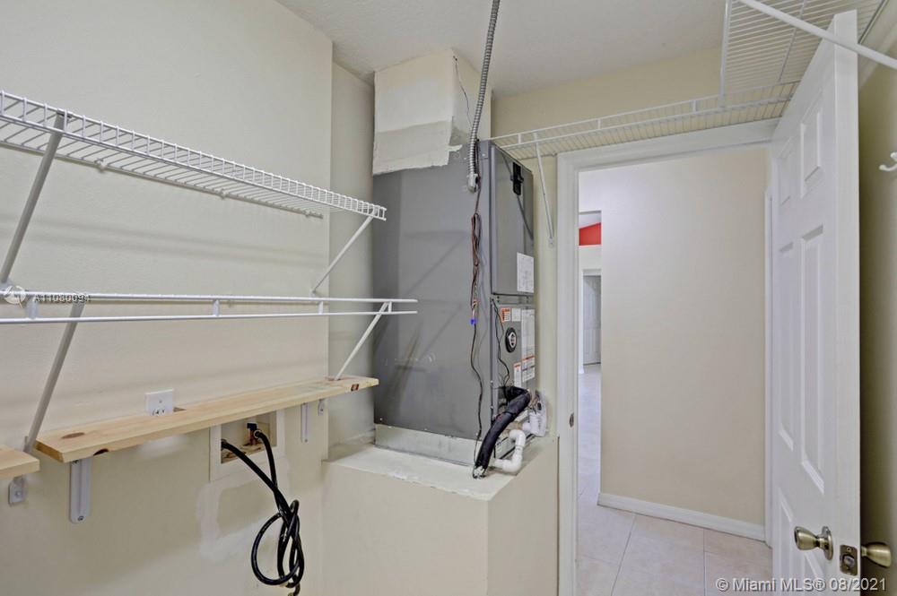 918 Southwest Longfellow Road, Unit 918 Port St. Lucie, FL 34953 - Photo 33 of 53 a bathroom with a shower