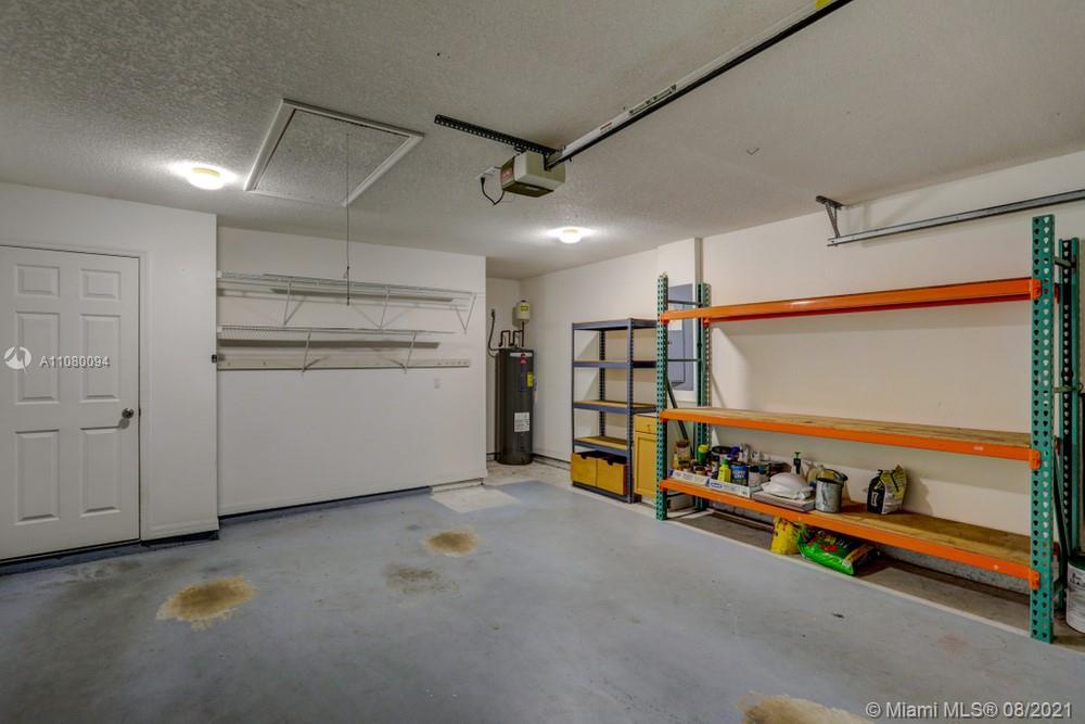 918 Southwest Longfellow Road, Unit 918 Port St. Lucie, FL 34953 - Photo 41 of 53 a view of a room with gym equipment