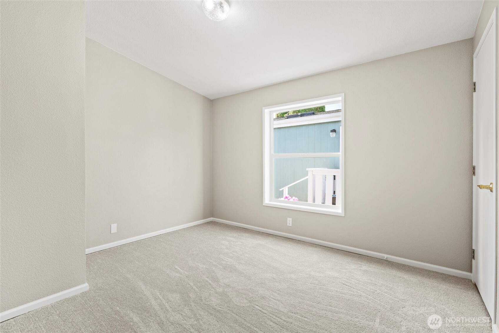 23825 15th Avenue Southeast, Unit 108 Bothell, WA 98021 - Photo 18 of 39 an empty room with a window
