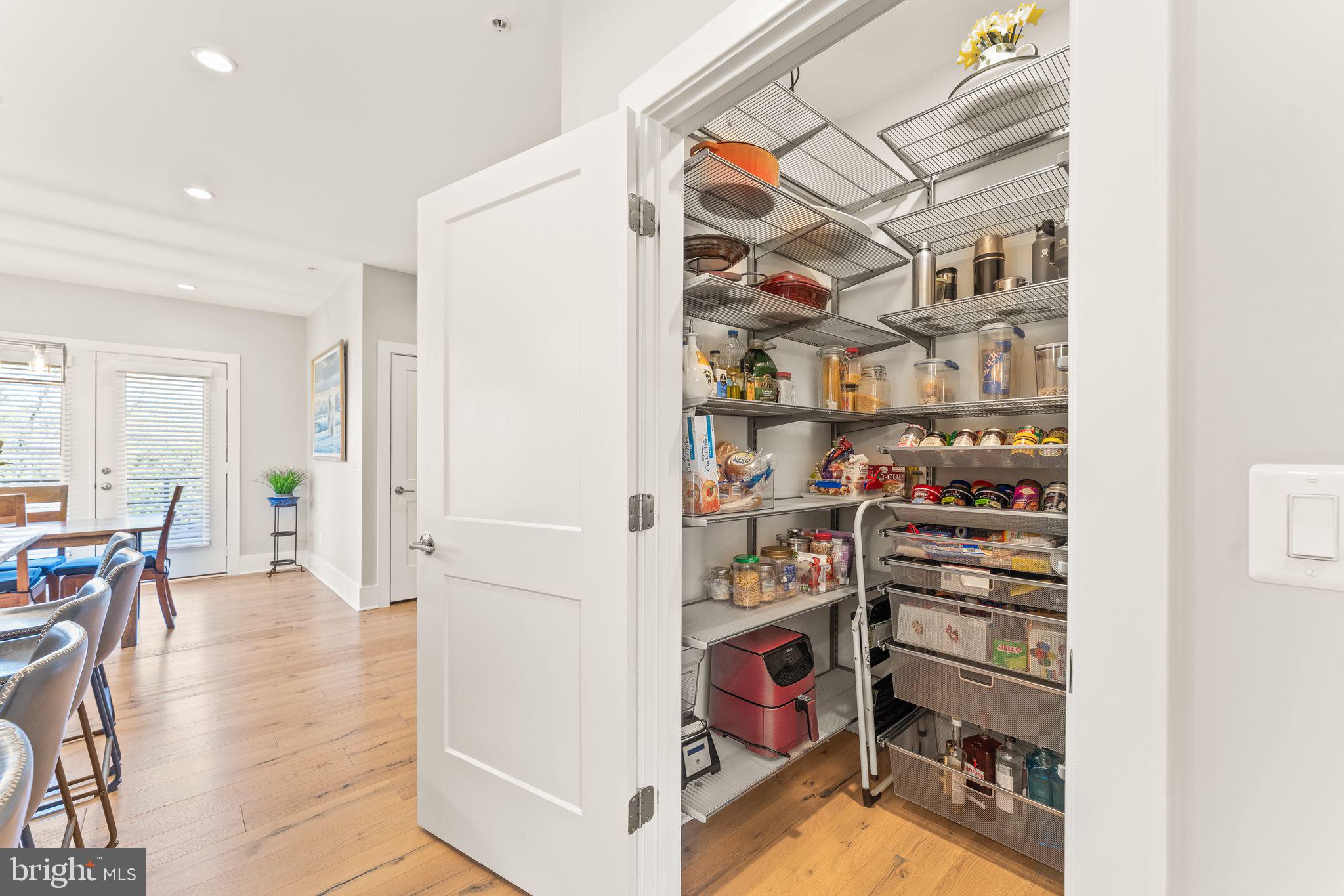 20052 Old Line Terrace Ashburn, VA 20147 - Photo 12 of 67 a view of a livingroom with shelves