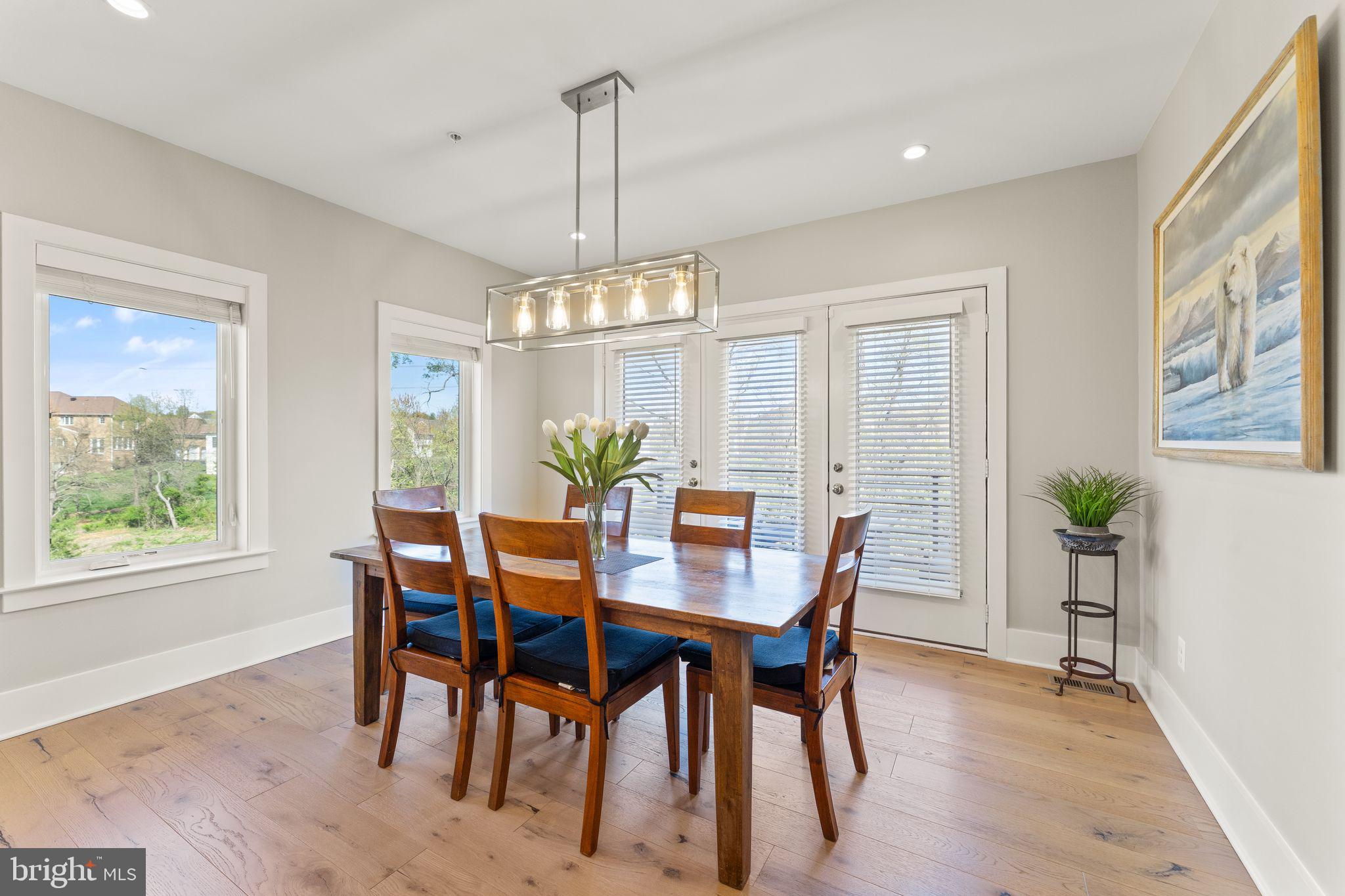 20052 Old Line Terrace Ashburn, VA 20147 - Photo 13 of 67 a view of a dining room with furniture window and outside view