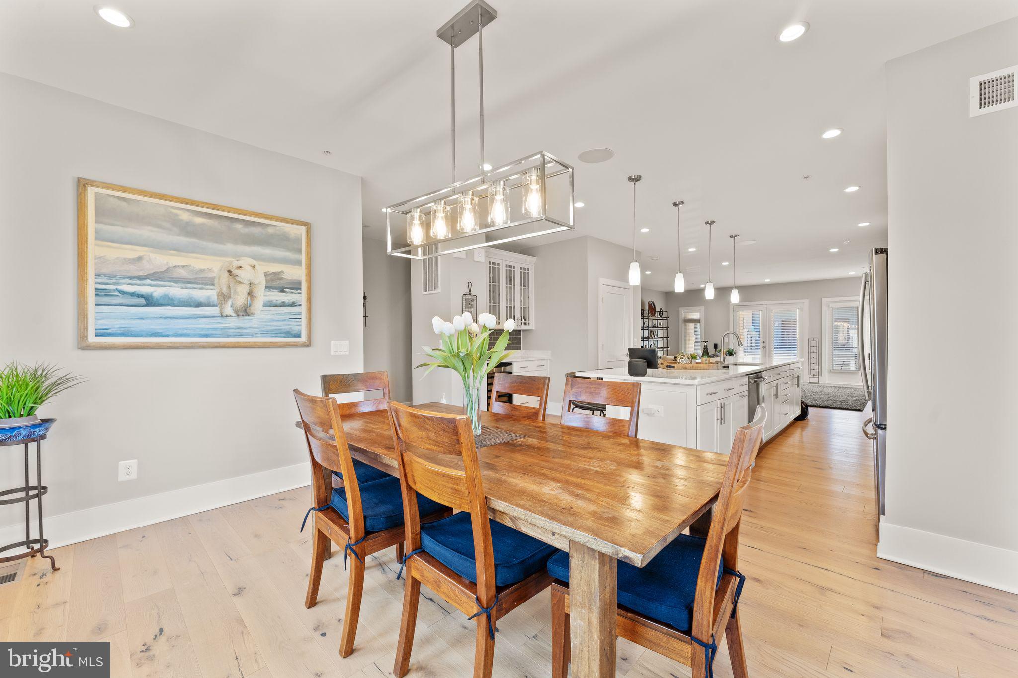 20052 Old Line Terrace Ashburn, VA 20147 - Photo 15 of 67 a view of a dining room and livingroom