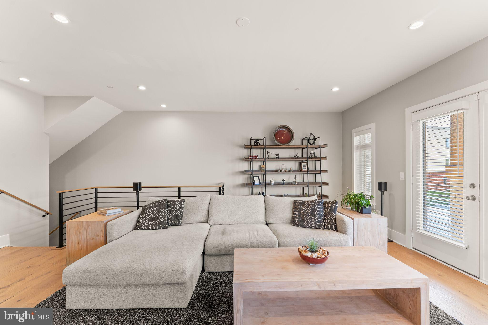 20052 Old Line Terrace Ashburn, VA 20147 - Photo 19 of 67 a living room with furniture and a table
