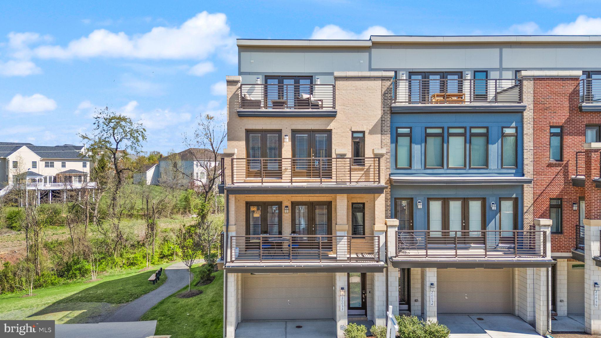 20052 Old Line Terrace Ashburn, VA 20147 - Photo 3 of 67 3-car tandem garage.
