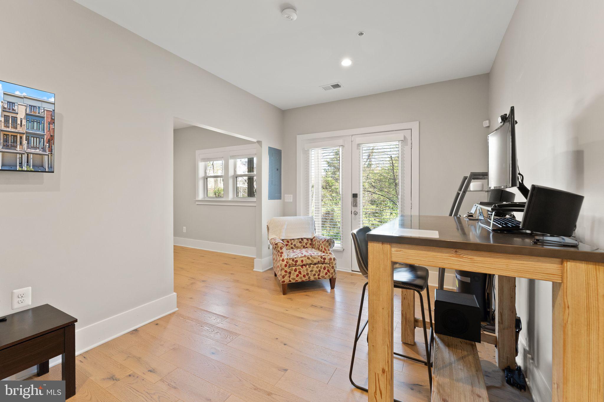 20052 Old Line Terrace Ashburn, VA 20147 - Photo 53 of 67 a living room with furniture and wooden floor
