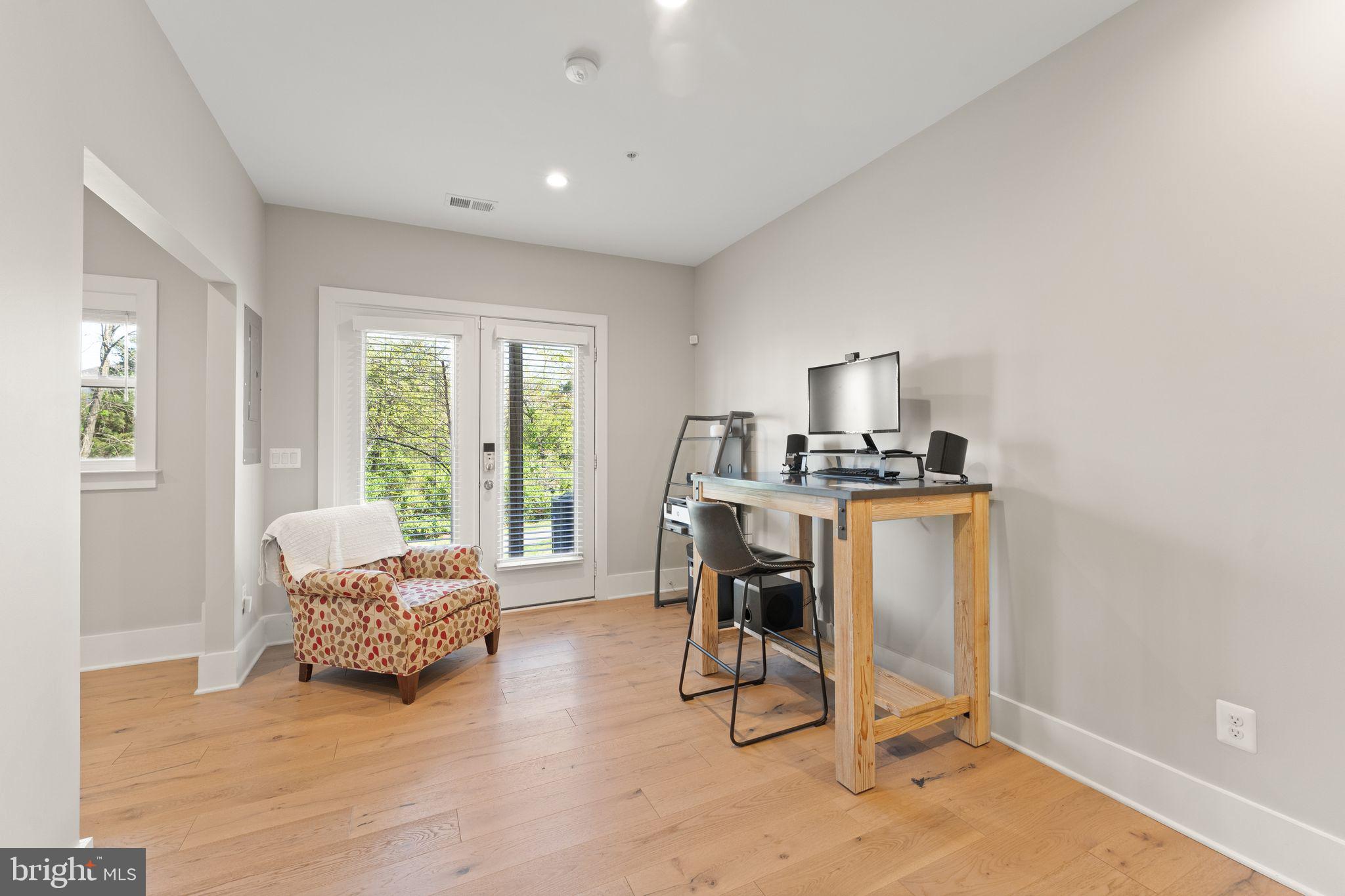 20052 Old Line Terrace Ashburn, VA 20147 - Photo 54 of 67 a living room with furniture and a window