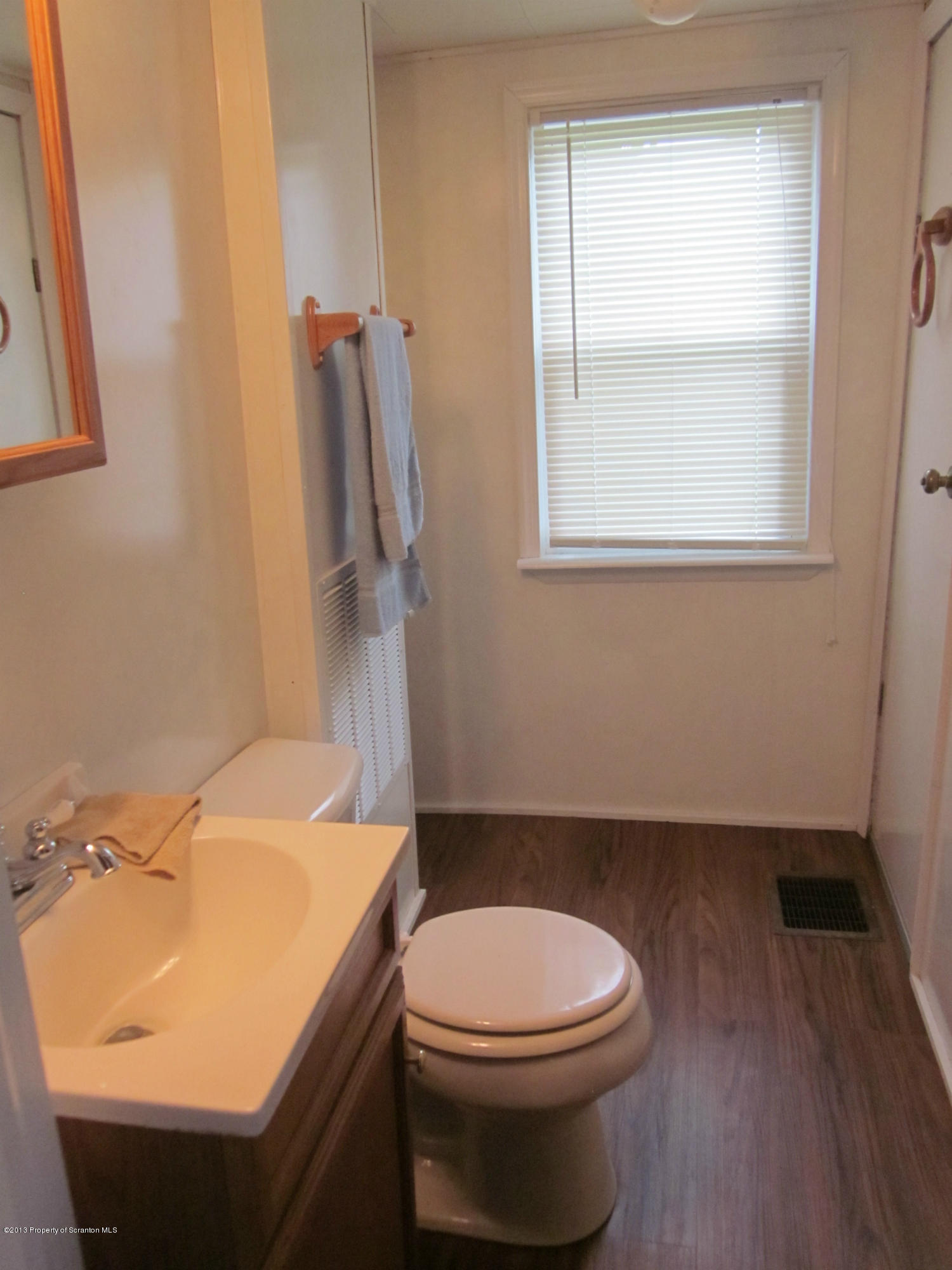 3362 Carter Road Montrose, PA 18801 - Photo 4 of 9 a bathroom with a sink and a toilet