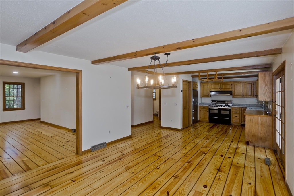 217 Inverness Lane Longmeadow, MA 01106 - Photo 12 of 42 a view of a living room with wooden floor