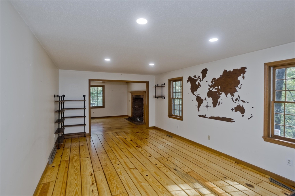 217 Inverness Lane Longmeadow, MA 01106 - Photo 18 of 42 a view of a bedroom with wooden floor and window