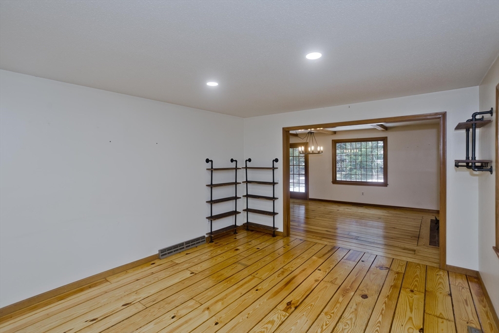 217 Inverness Lane Longmeadow, MA 01106 - Photo 19 of 42 a view of empty room with wooden floor