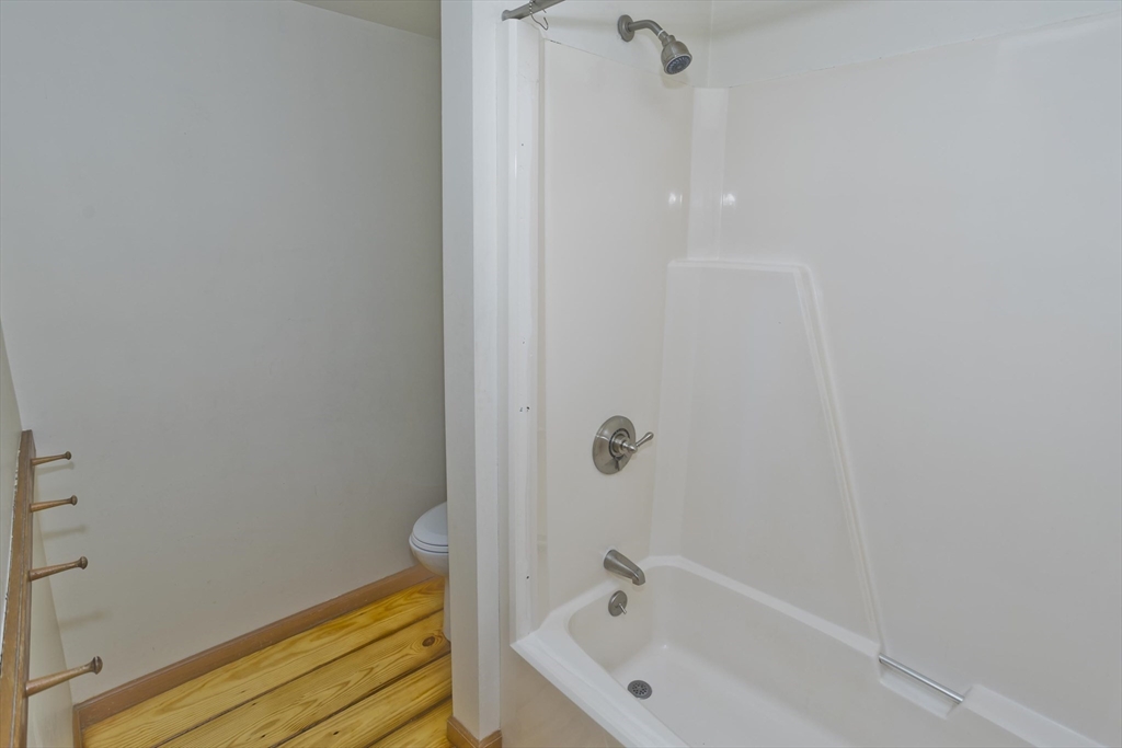 217 Inverness Lane Longmeadow, MA 01106 - Photo 22 of 42 a bathroom with a tub