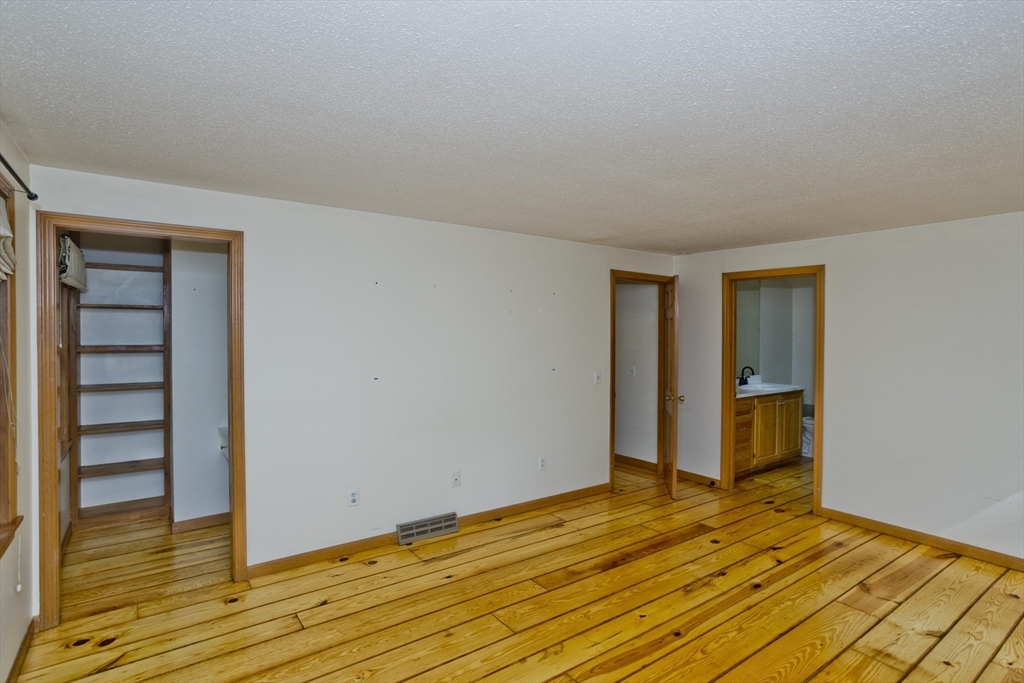 217 Inverness Lane Longmeadow, MA 01106 - Photo 27 of 42 a view of empty room with wooden floor