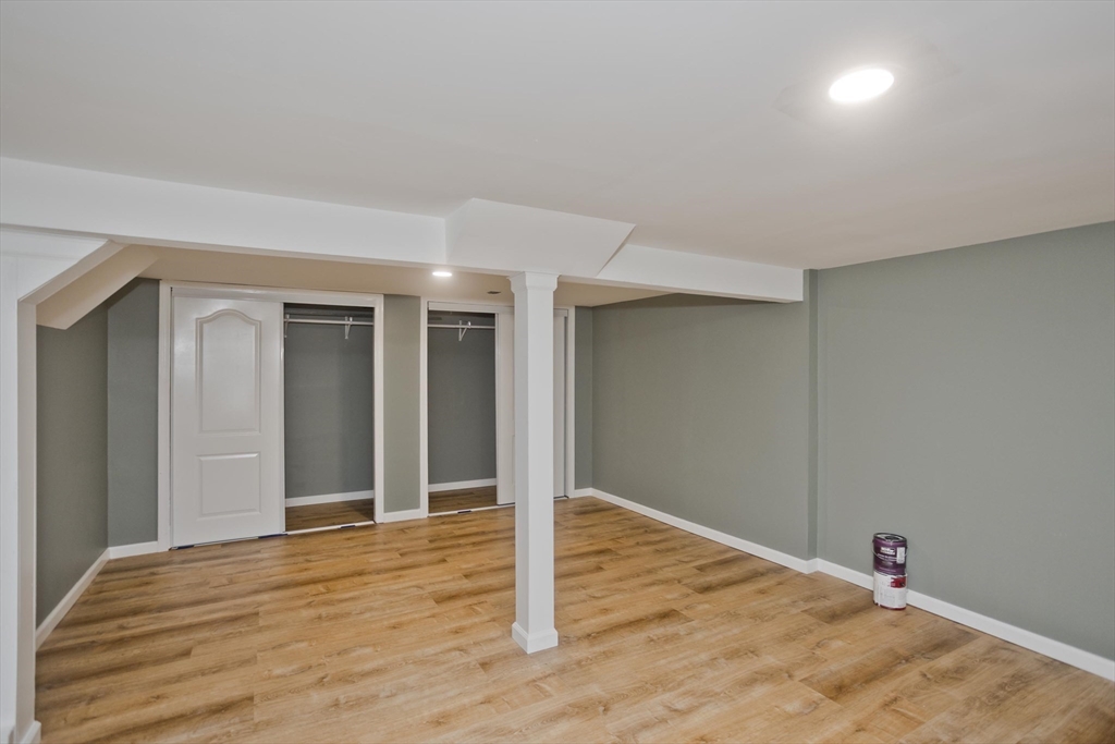 217 Inverness Lane Longmeadow, MA 01106 - Photo 40 of 42 a view of a big room with wooden floor and closet