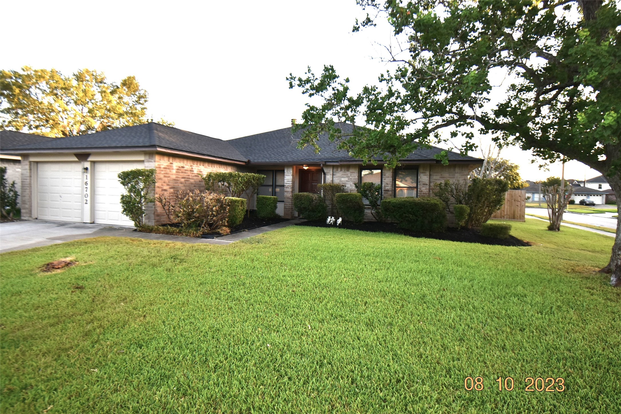 16702 Sheet Bend Way Friendswood, TX 77546 - Photo 1 of 22 a front view of a house with garden