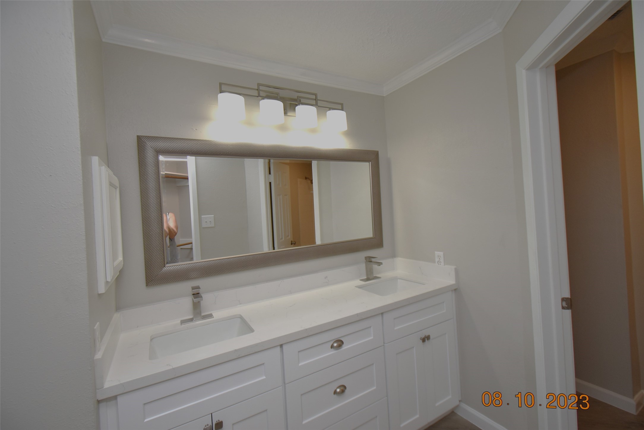 16702 Sheet Bend Way Friendswood, TX 77546 - Photo 17 of 22 a bathroom with a sink vanity and mirror