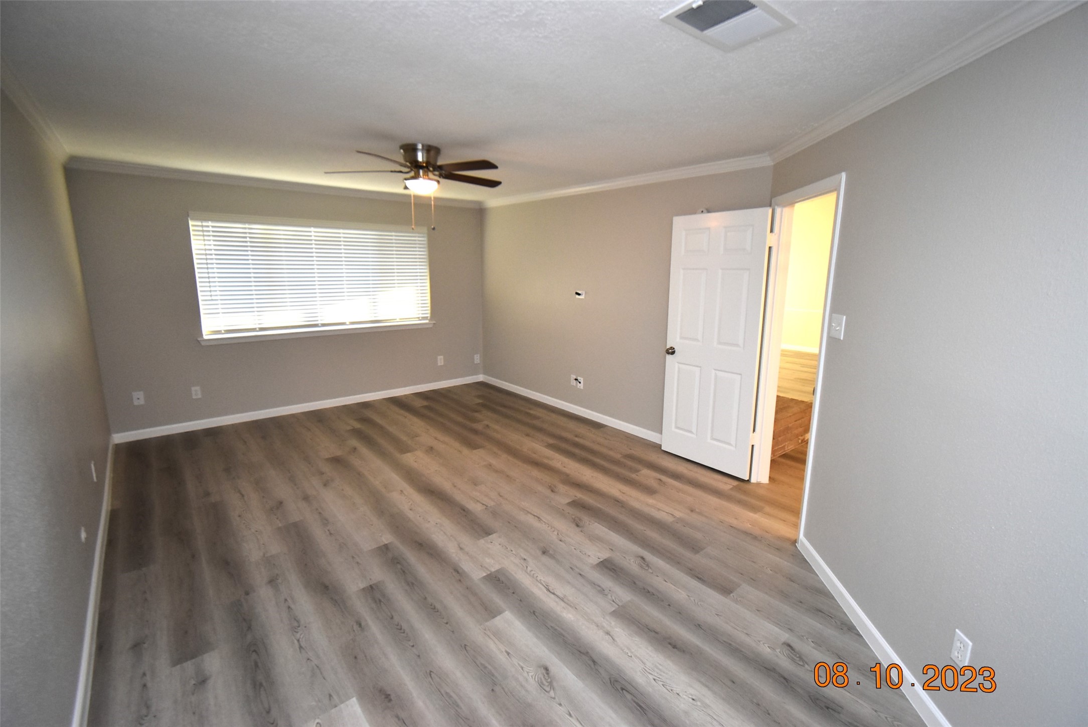 16702 Sheet Bend Way Friendswood, TX 77546 - Photo 20 of 22 wooden floor in an empty room with a window