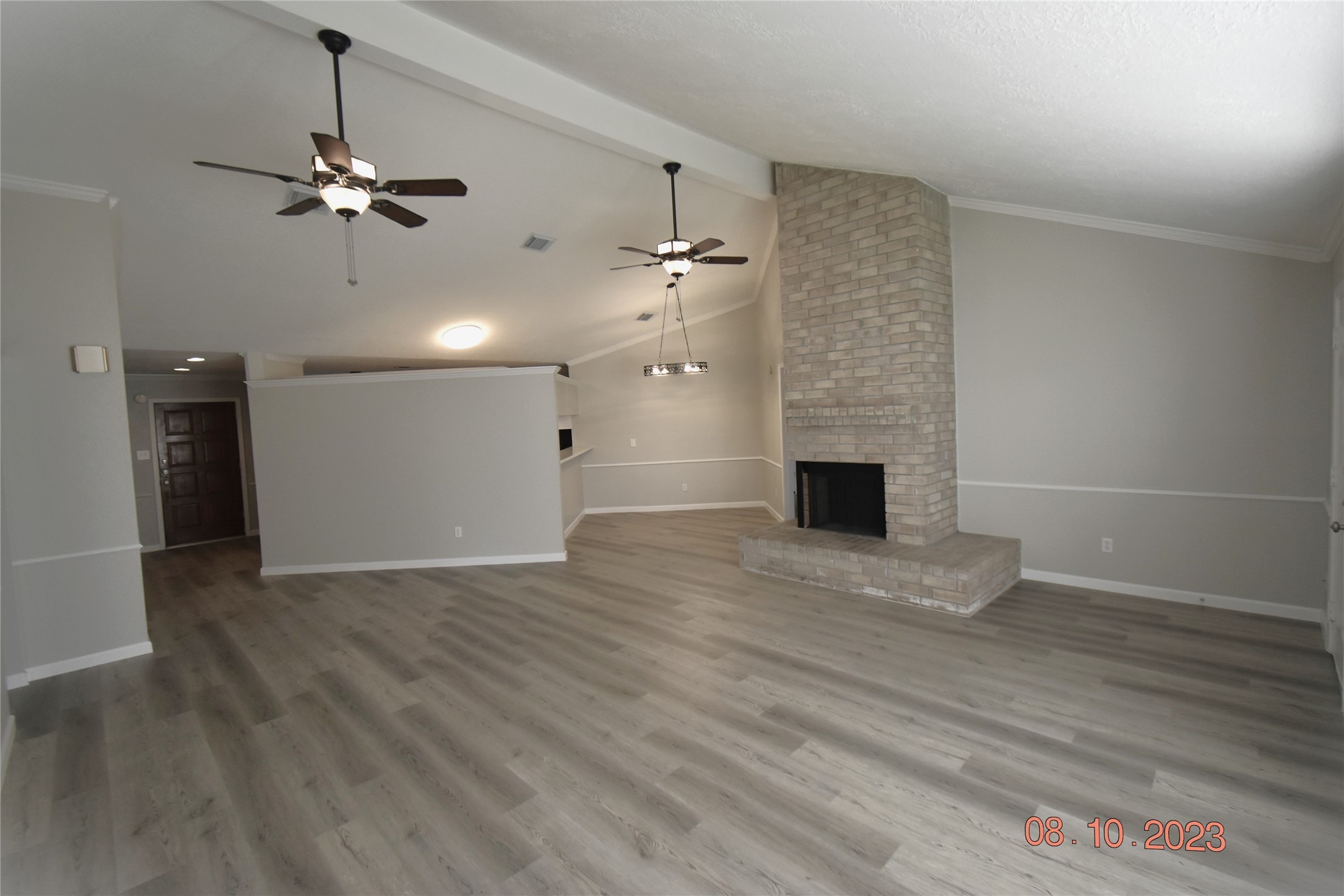 16702 Sheet Bend Way Friendswood, TX 77546 - Photo 4 of 22 wooden floor in an empty room with a window