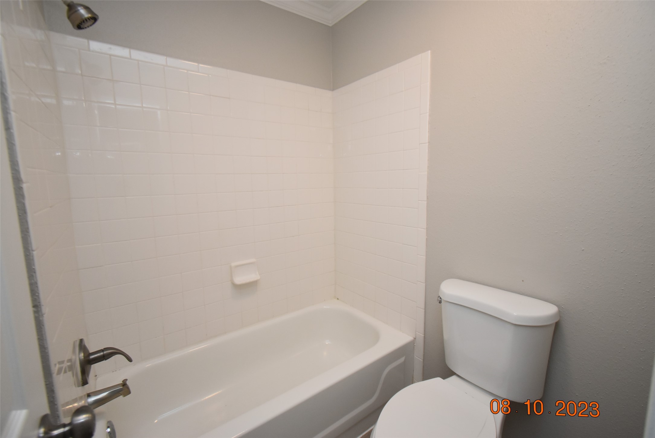 16702 Sheet Bend Way Friendswood, TX 77546 - Photo 10 of 22 a white toilet sitting next to a bath tub