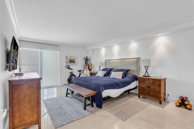 a bed room with furniture and a table