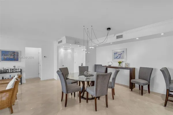 a view of a dining room with furniture