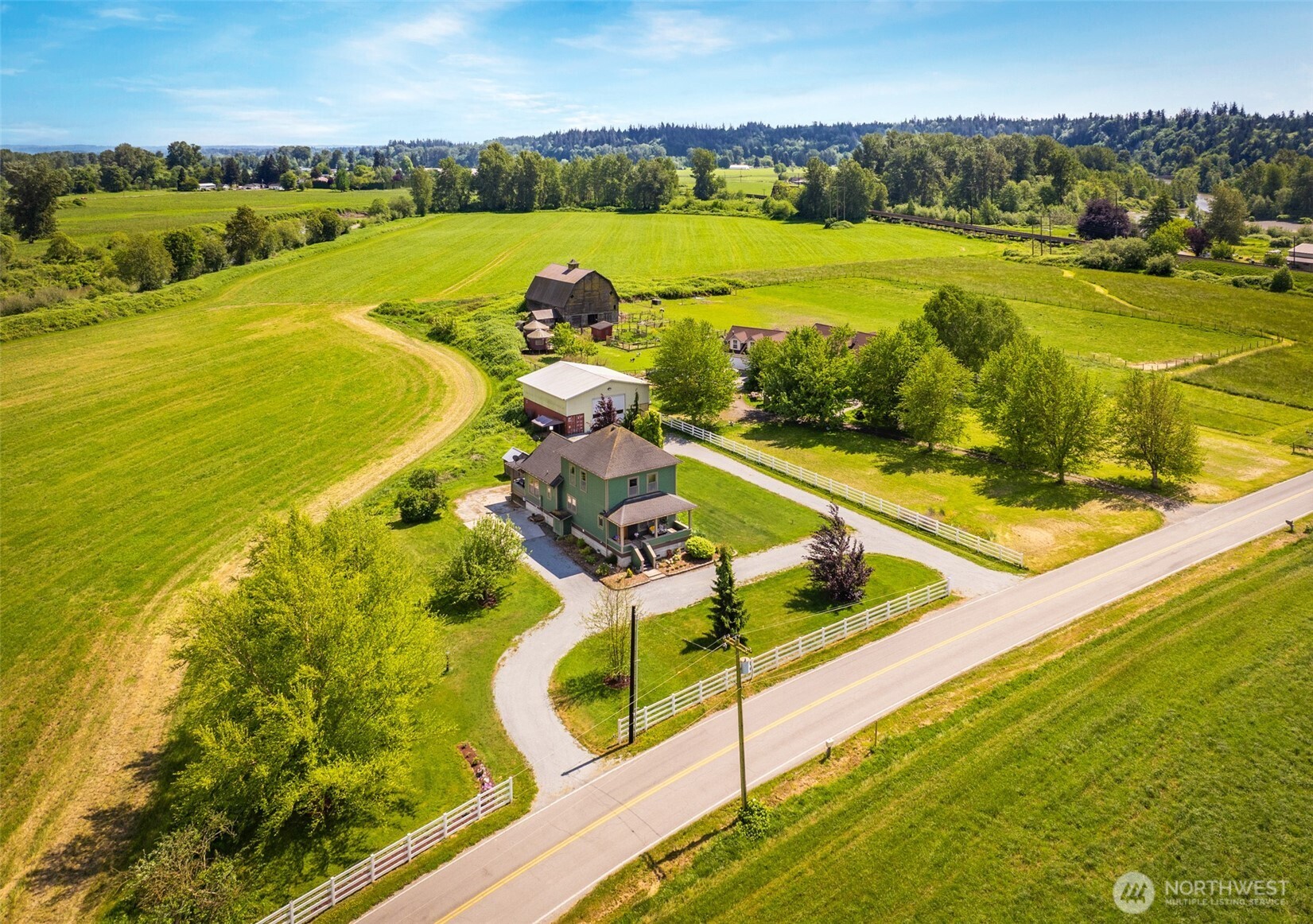 2304 Norman Road Stanwood, WA 98292 - Photo 25 of 39 a view of an ocean and a city