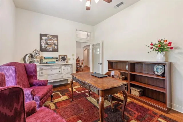 a workspace with furniture and window