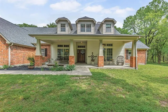 a view of a trees in front of a house