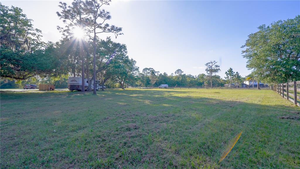 0 Haywood Ruffin Road St. Cloud, FL 34771 - Photo 3 of 23 a view of outdoor space with garden and trees